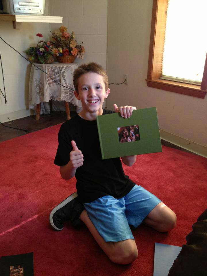 My husband and I aren't perfect or rich or beautiful and I was worried about what he would think when he saw our lifebook and he was THRILLED!  He ran through the boys home he was staying at showing everyone who would look his new family and he said he looked at the picture of his father and I every night until he came home!